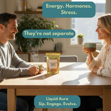 Image of a man and woman in their 40's sipping a mushroom latte at the kitchen table. 